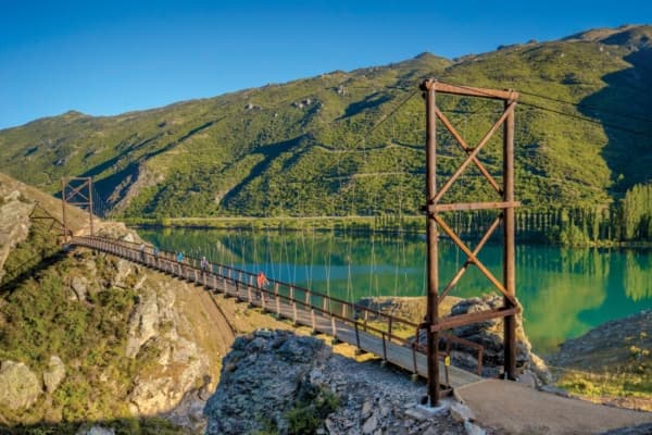 Trail bridge with views toward the Pisa Range